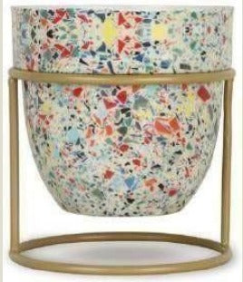 Pot with stand for indoor plants.