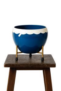 Pot with stand for indoor plants.